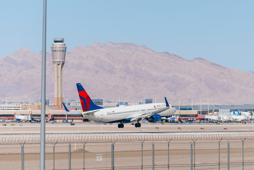 A Delta aircraft taking off at McCarran International Airport.